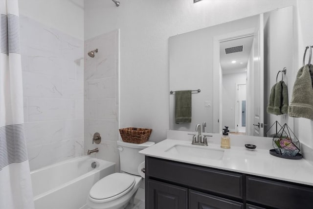 113 University Lands Dr, Liberty Hill, TX 78642 - bathroom with shower / tub combo, toilet, and vanity