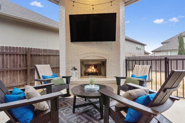 113 University Lands Dr, Liberty Hill, TX 78642 - view of patio / terrace featuring an outdoor living space with a fireplace