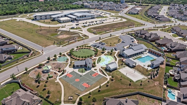 113 University Lands Dr, Liberty Hill, TX 78642 - aerial overview of property's location featuring a pool area and nearby suburban area