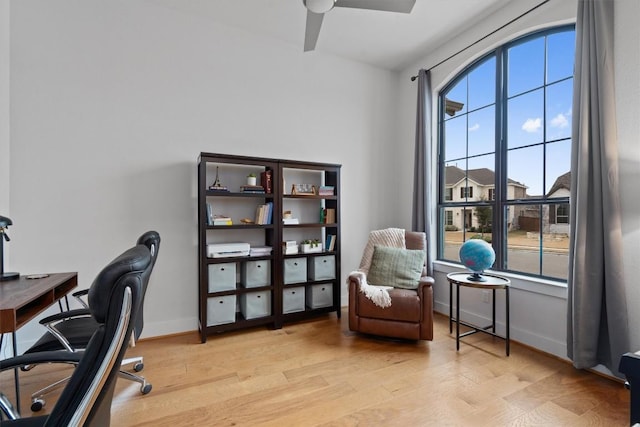 113 University Lands Dr, Liberty Hill, TX 78642 - office with a ceiling fan, wood finished floors, and baseboards