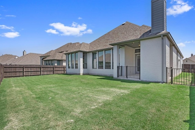 113 University Lands Dr, Liberty Hill, TX 78642 - back of property with a chimney and brick siding