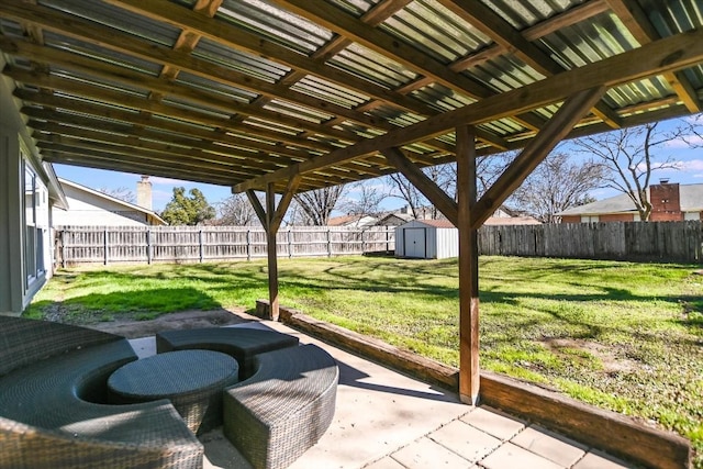 view of patio featuring a storage unit