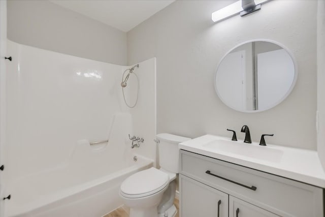 full bathroom with shower / bathtub combination, vanity, and toilet