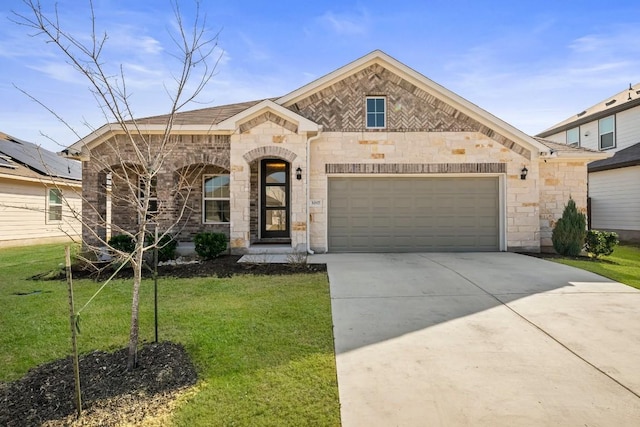 view of front of home featuring a garage and a front yard