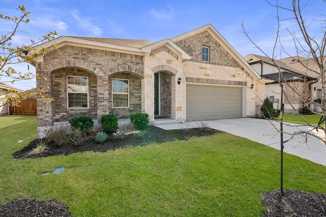 view of front facade with a garage and a front yard