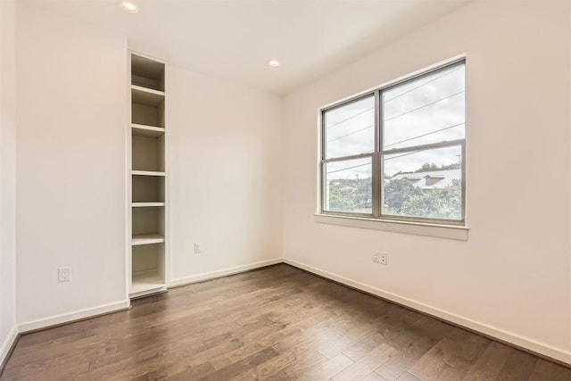 22300 Shotts Dr, Spicewood, TX 78669 - unfurnished room featuring wood finished floors, baseboards, and recessed lighting