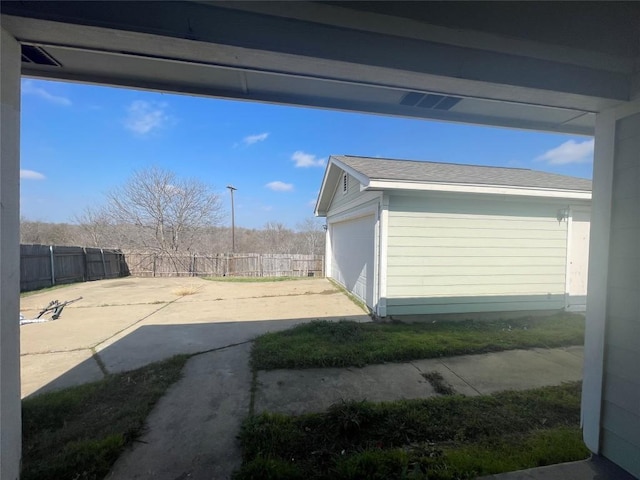 exterior space with a garage