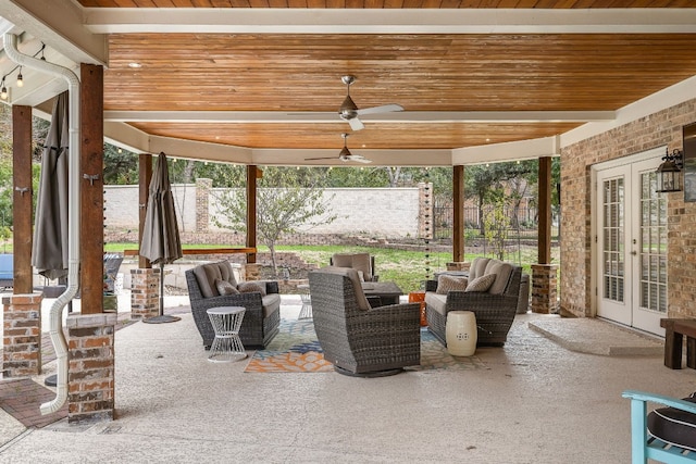 view of patio / terrace with french doors, ceiling fan, and outdoor lounge area