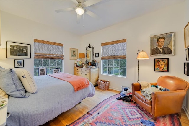 bedroom featuring ceiling fan and light wood-type flooring