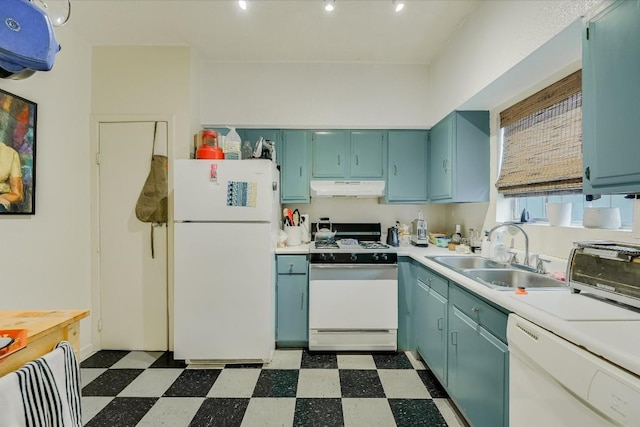 kitchen featuring sink and white appliances