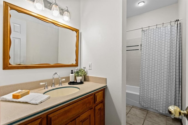 bathroom with shower / tub combo, vanity, and tile patterned floors