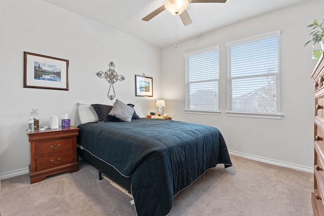 7716 Arezzo Dr, Round Rock, TX 78665 - carpeted bedroom with baseboards and a ceiling fan