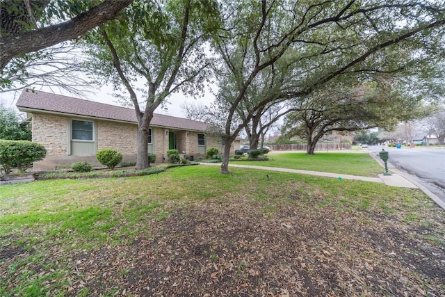 exterior space with a front lawn