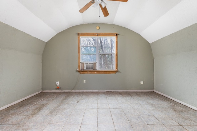 additional living space featuring cooling unit, ceiling fan, lofted ceiling, and light tile patterned floors