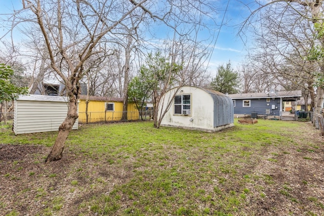 view of yard with a storage unit