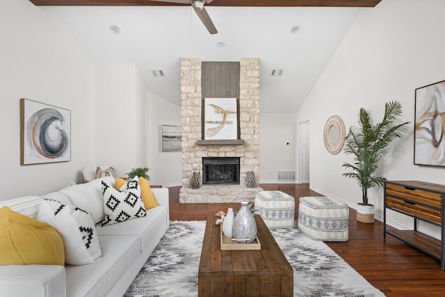 living room featuring a fireplace, dark wood-type flooring, high vaulted ceiling, and ceiling fan