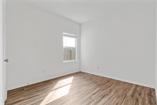 125 Mica Trl, Maxwell, TX 78656 - unfurnished room with wood finished floors and baseboards
