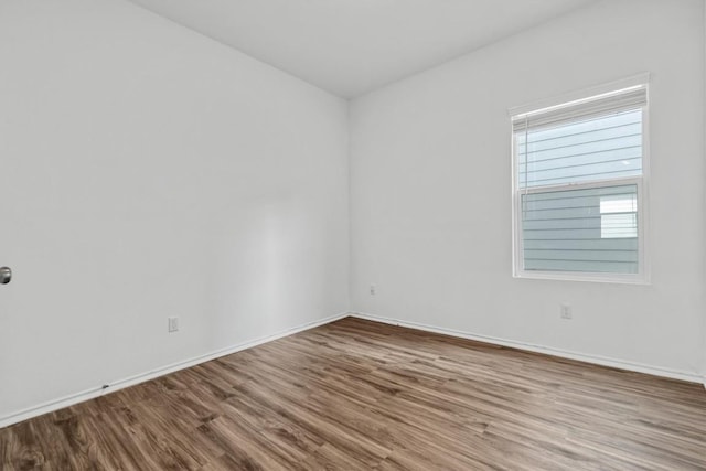 125 Mica Trl, Maxwell, TX 78656 - unfurnished room featuring wood finished floors and baseboards