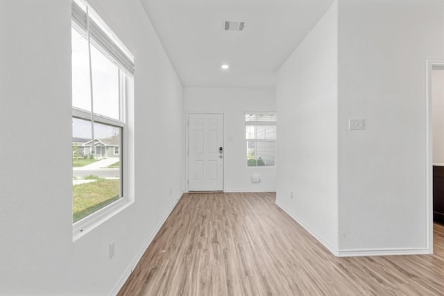 125 Mica Trl, Maxwell, TX 78656 - foyer entrance with wood finished floors, baseboards, and recessed lighting