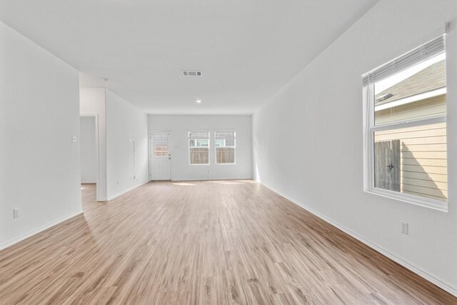 125 Mica Trl, Maxwell, TX 78656 - unfurnished room featuring light wood finished floors and baseboards
