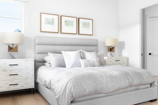 bedroom featuring wood-type flooring