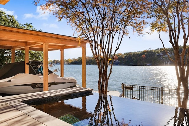 dock area with a water view