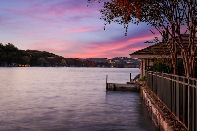 view of dock with a water view