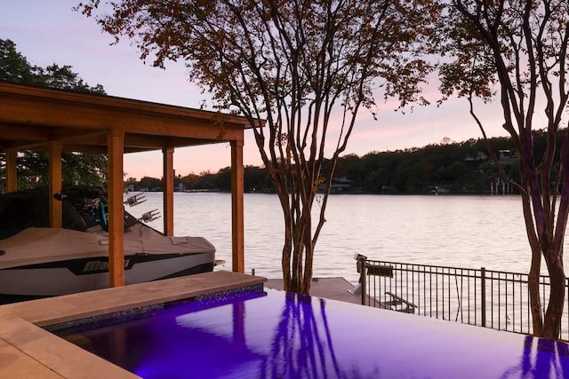 view of dock with a water view