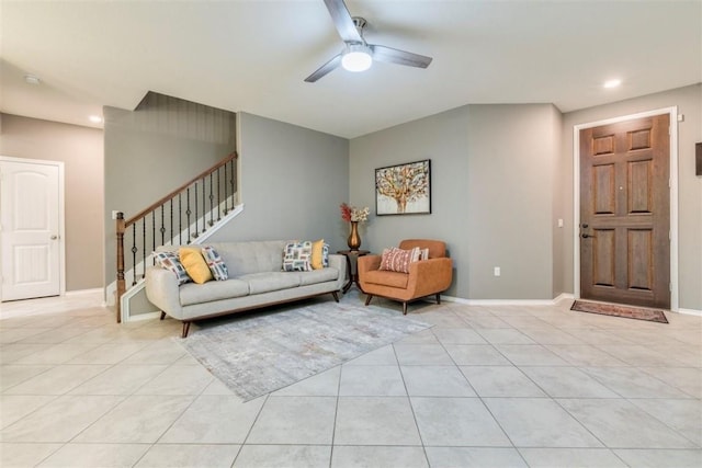 living room featuring ceiling fan and light tile patterned floors