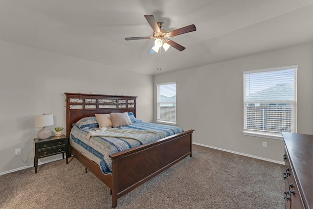 bedroom featuring a ceiling fan, carpet flooring, and baseboards