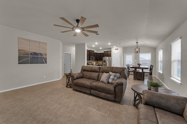 living room with lofted ceiling, recessed lighting, visible vents, a ceiling fan, and baseboards