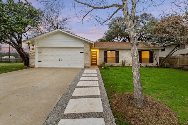 5102 Summerset Trl, Austin, TX 78749 - mid-century modern home featuring stone siding, driveway, and an attached garage