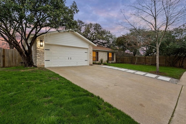 5102 Summerset Trl, Austin, TX 78749 - view of front facade featuring driveway and stone siding