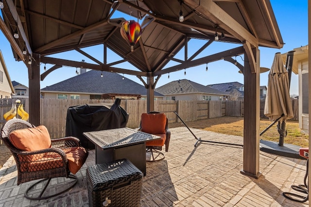 view of patio featuring a gazebo and grilling area