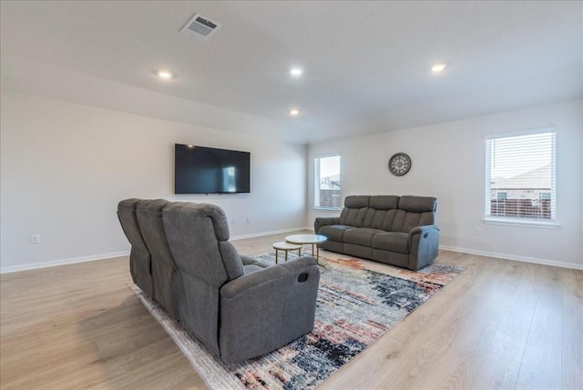 2501 Bear Juice Vw, Leander, TX 78641 - living area featuring light wood-type flooring, recessed lighting, and baseboards