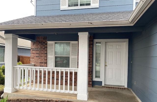 property entrance featuring a porch