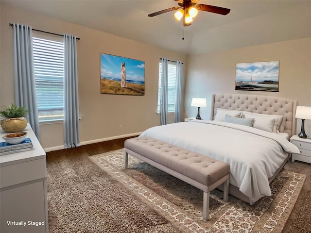 bedroom with multiple windows and ceiling fan