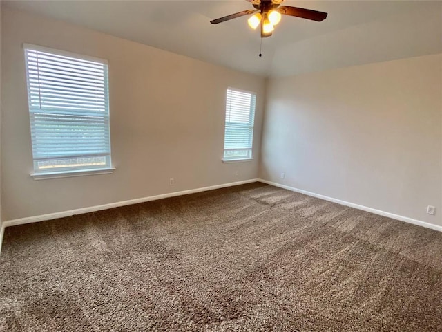 carpeted empty room with ceiling fan