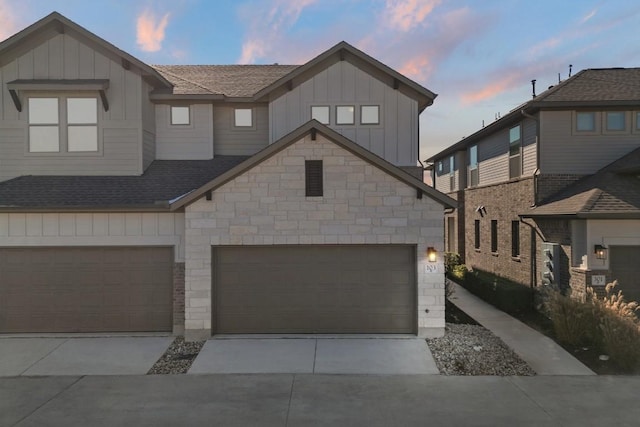 view of front of property with a garage