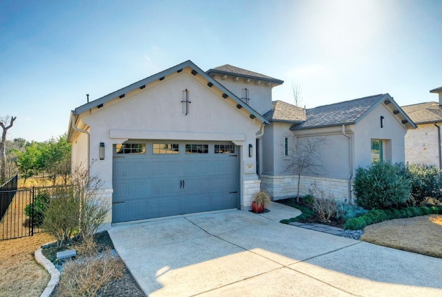 mediterranean / spanish house with a garage