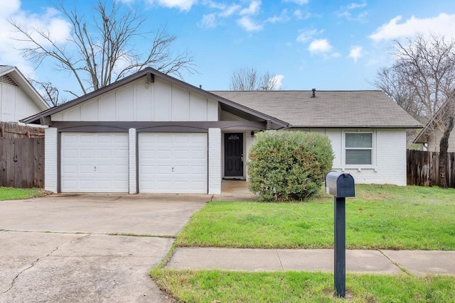 ranch-style house with a garage and a front lawn