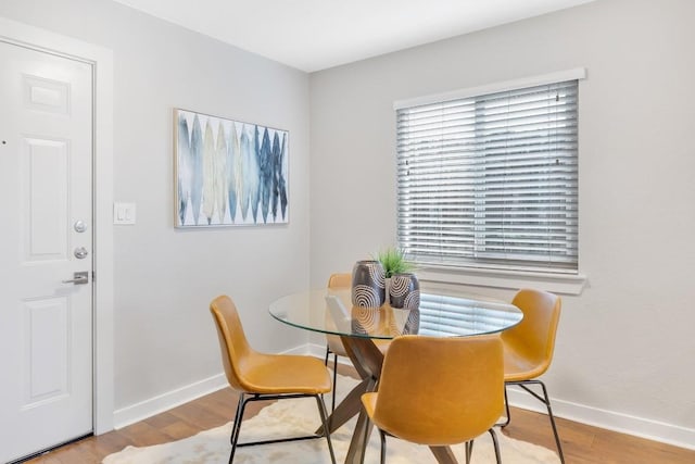 dining area with light wood-type flooring