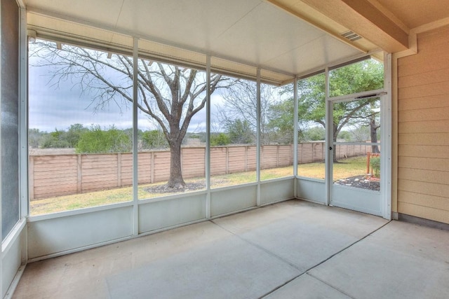 view of unfurnished sunroom