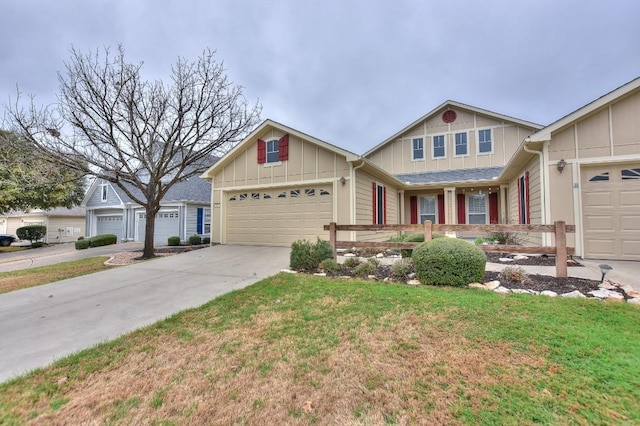 craftsman inspired home featuring a garage and a front yard