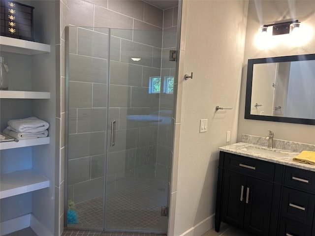 bathroom with vanity and walk in shower