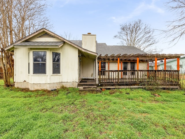 400 El Secreto St, Buda, TX 78610 - view of front of house featuring a pergola, a chimney, a front yard, and roof with shingles