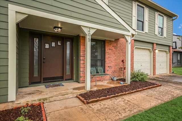 property entrance with a garage