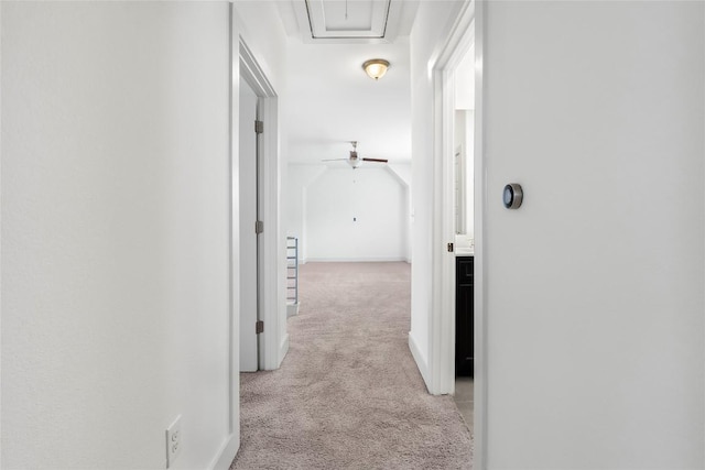 2211 Capulet St, Austin, TX 78741 - hall featuring light carpet and attic access