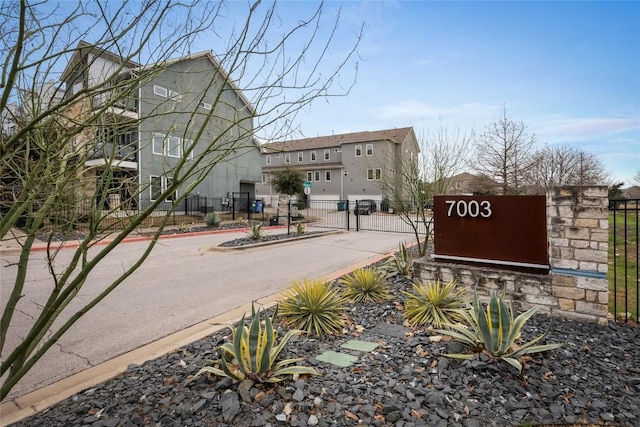 2211 Capulet St, Austin, TX 78741 - view of street featuring a gate and curbs
