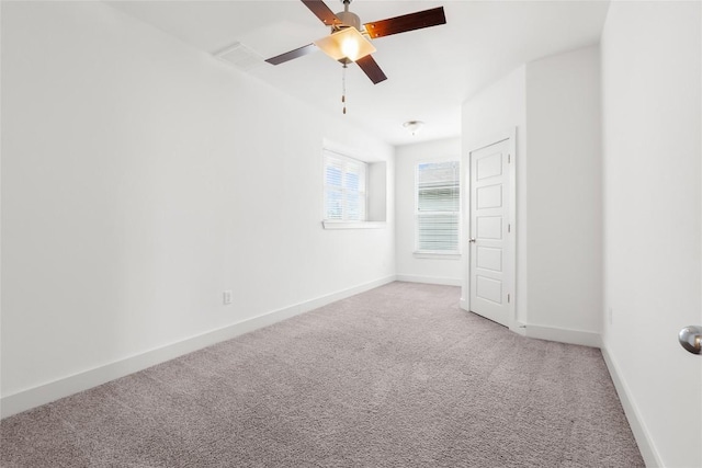 2211 Capulet St, Austin, TX 78741 - unfurnished room with carpet flooring, ceiling fan, and baseboards